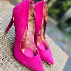 Hot pink suede high heels.